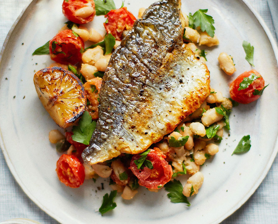 Pan-fried sea bream with cannellini beans and tomatoes